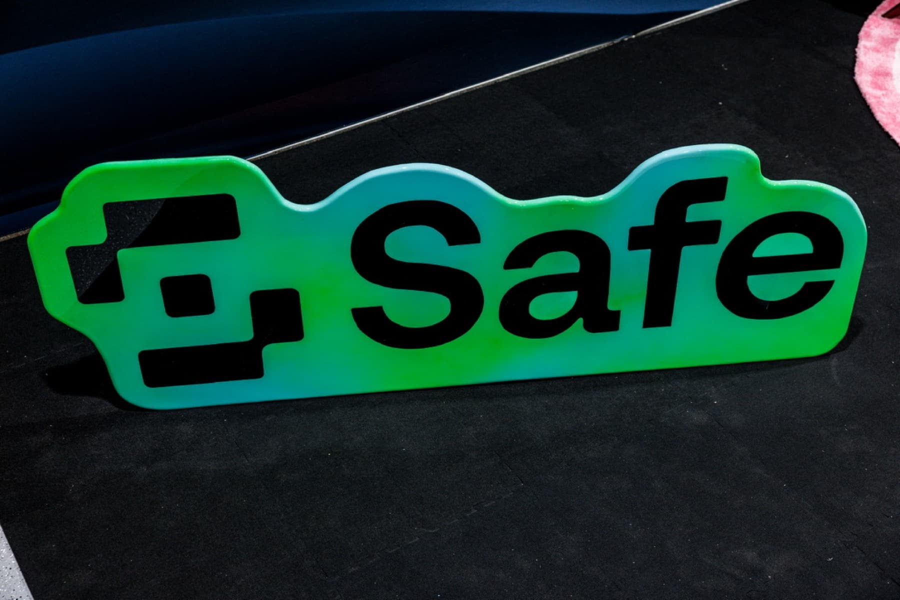 Gloss wood sign for Safe, made in our shop